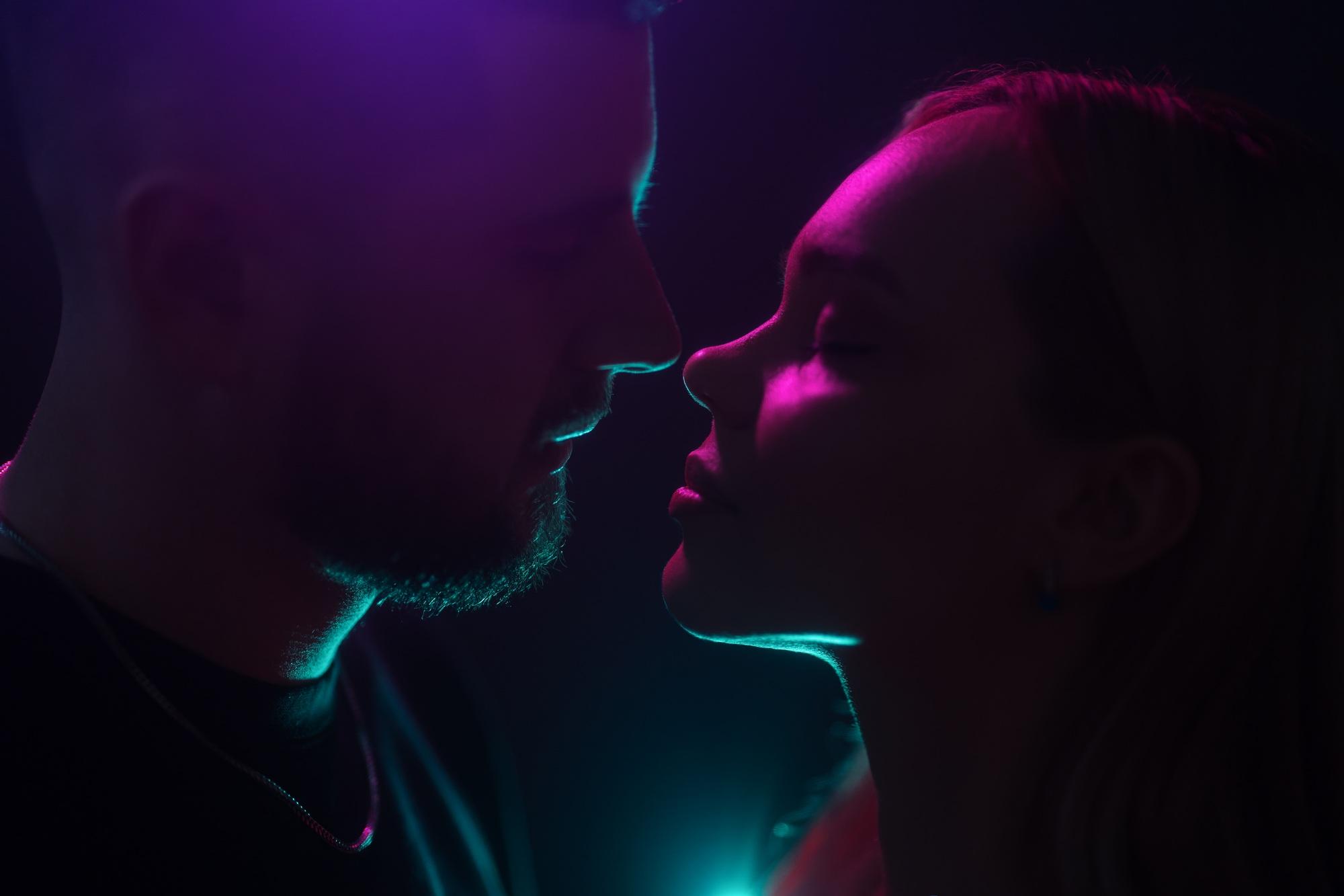 Silhouetted Couple in Neon Romance